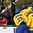 GRAND FORKS, NORTH DAKOTA - APRIL 23: Sweden's Axel Jonsson Fjallby #16, Jakob Cederholm #3 and Jesper Bokvist #10 celebrate after a first period goal by Tim Wahlgren #22 against Canada during semifinal round action at the 2016 IIHF Ice Hockey U18 World Championship. (Photo by Minas Panagiotakis/HHOF-IIHF Images)

